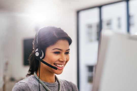 logistics services representative speaking with headset